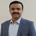 Dr Ganesh PB - MA, MPhil, PhD.